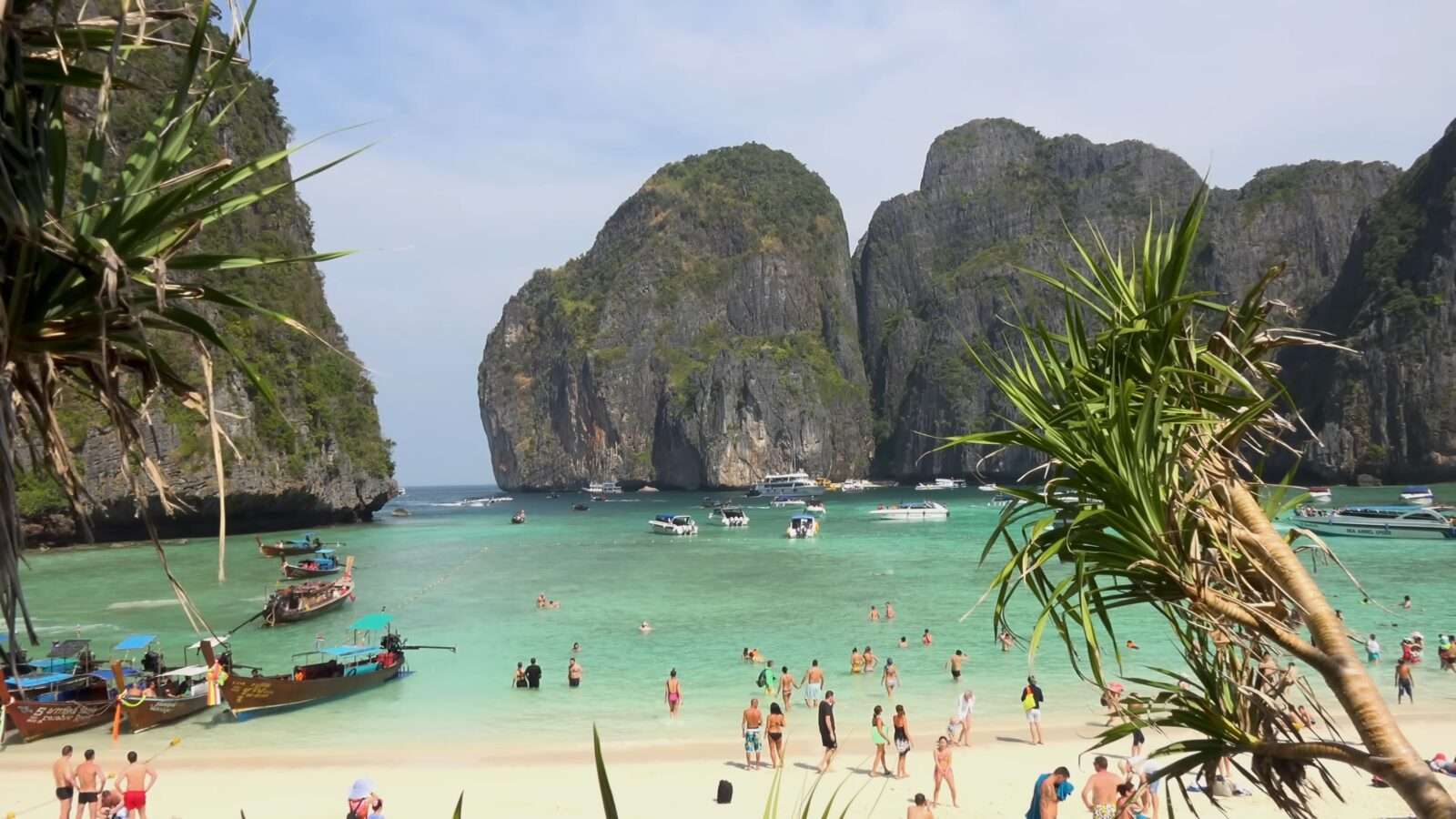 View of Maya Bay on Pee Pee Island, Thailand, where the blue sea and green mountains present a unique sight, Wonders of the World Pictures.
