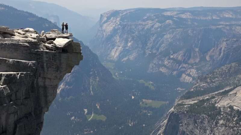 Picture of a man standing on a rock