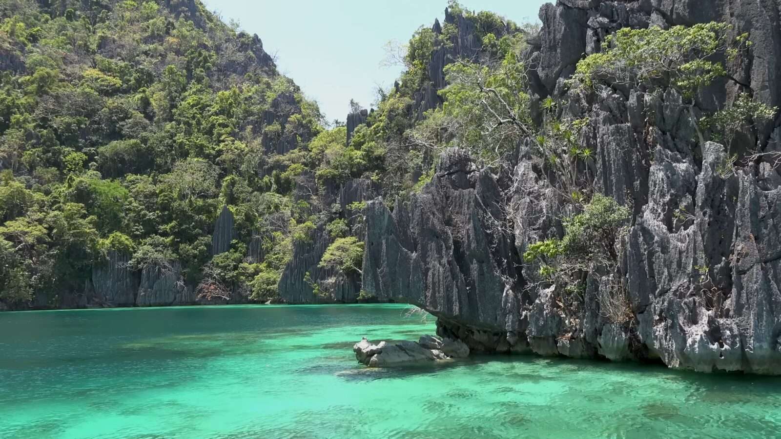 The view of the sparkling blue-green waters of Coron Lagoon, which offers a unique example of natural beauty, Wonders of the World Pictures.
