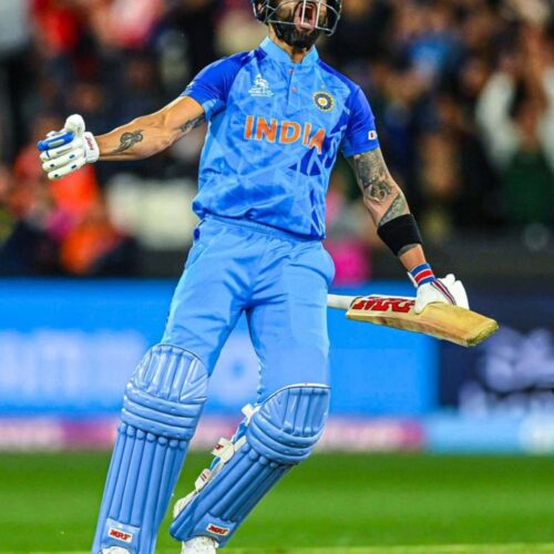 Virat Kohli celebrating passionately on the cricket field in blue India jersey – 4K action wallpaper