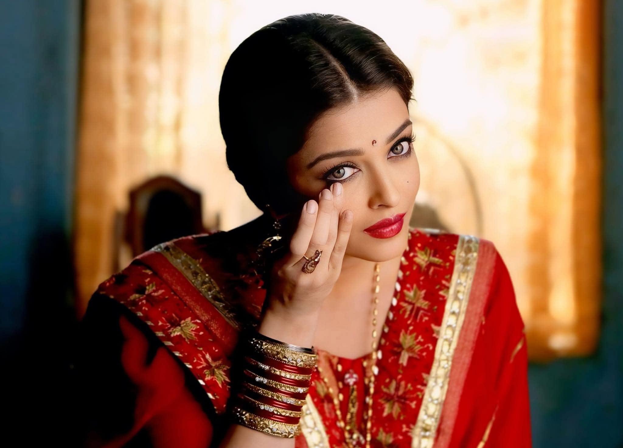 Aishwarya Rai red bridal saree closeup traditional Indian bride look