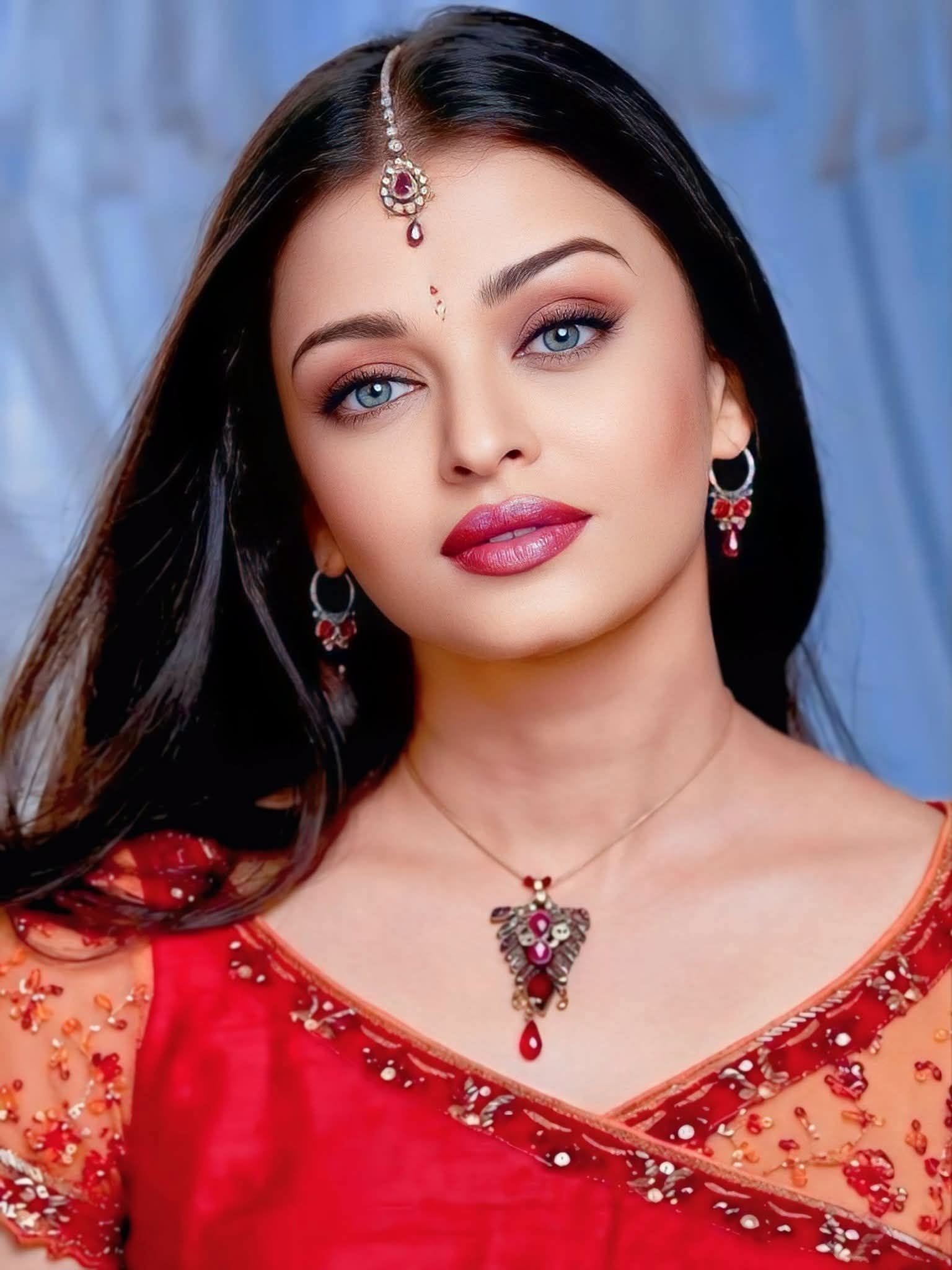 Aishwarya Rai in red dress modern stylish look Indian actress portrait