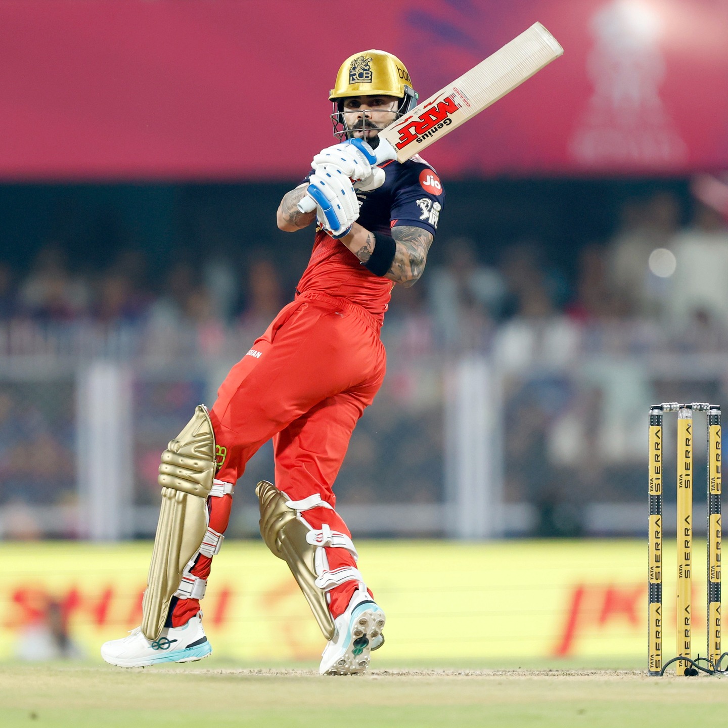 Virat Kohli playing an aggressive batting shot in IPL for RCB